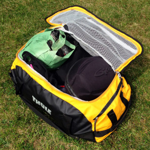 Thule_Chasm-Medium_water-resistant-convertible-duffel-bag_Zinnia-yellow_packed-open-bottom