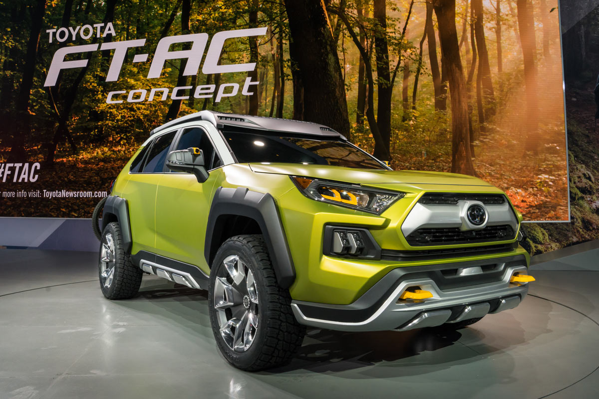 Toyota FT-AC adventure concept vehicle SUV with integrated bike rack and mountain bike trail lights