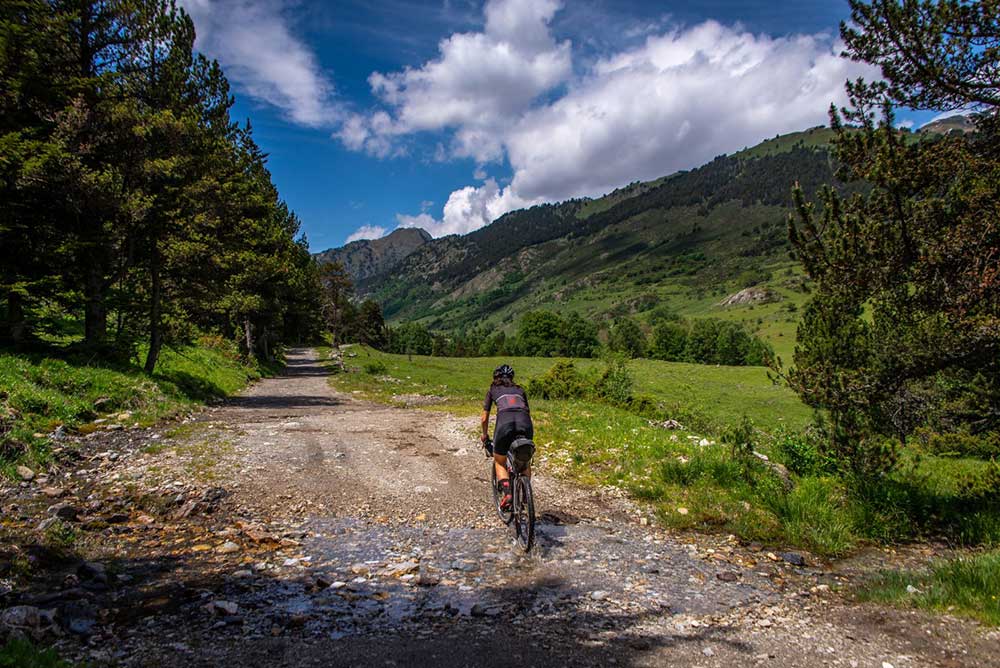 exploring abandoned alpine towns by gravel bicycle in Spain in the pyrenees mountains