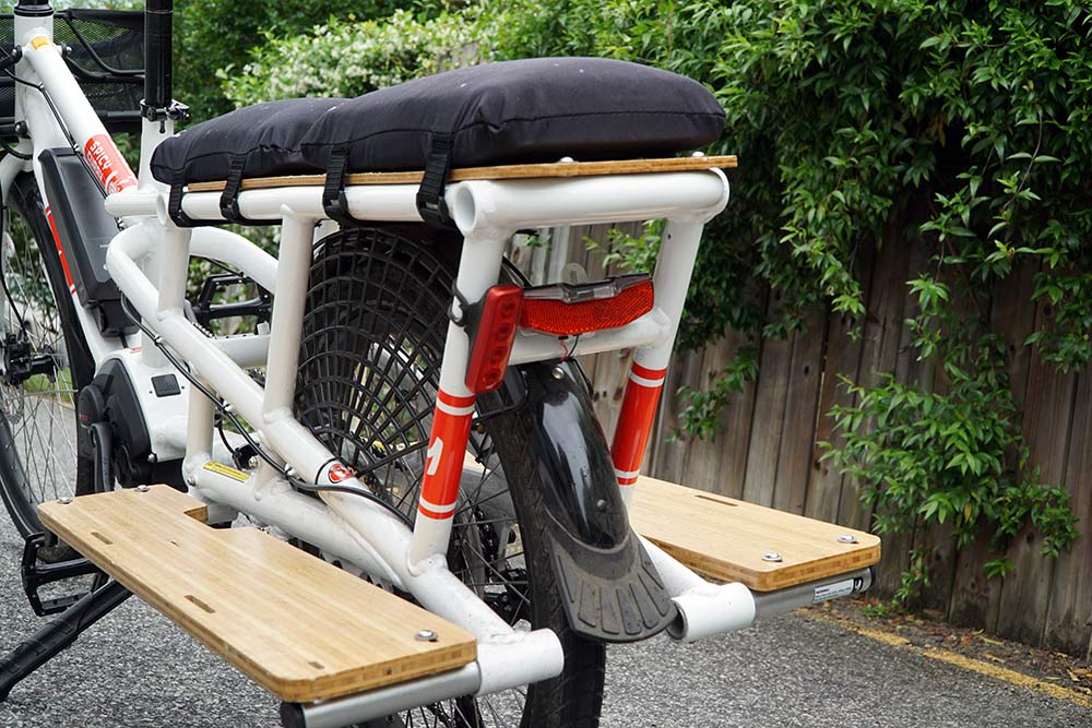 how much weight can a yuba spicy curry e-cargo bike carry