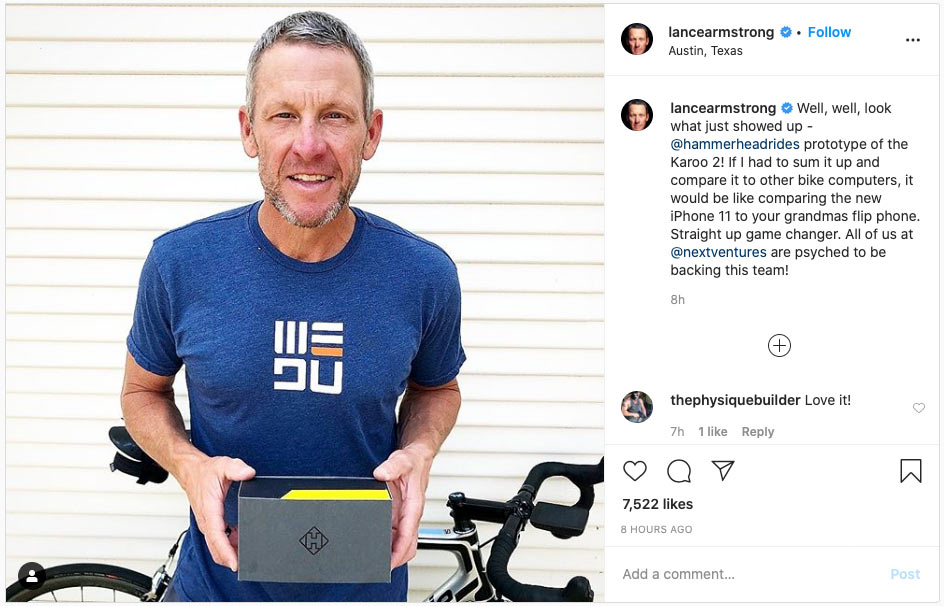 lance armstrong shows off box for the new hammerhead karoo 2 gps cycling computer