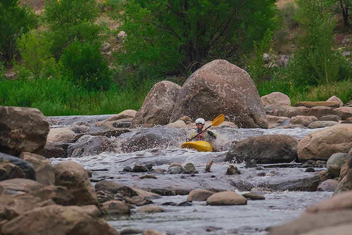 Kayaking and paddling on the Animas River Durango Colorado