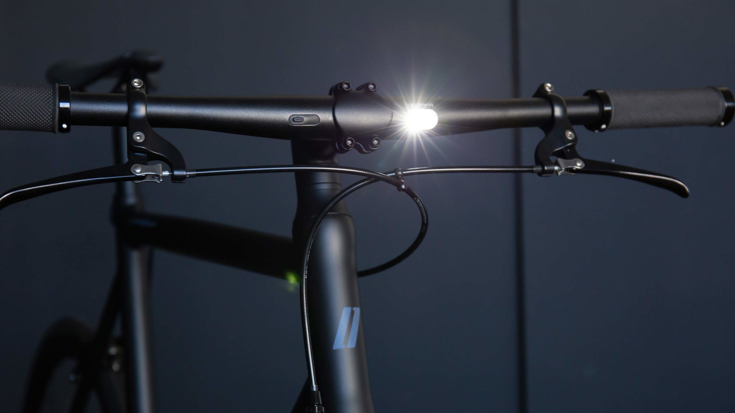 LightSKIN integrated commuter bike headlight taillight, StVZO-certified hidden internal LED seatpost handlebar lighting, bar light
