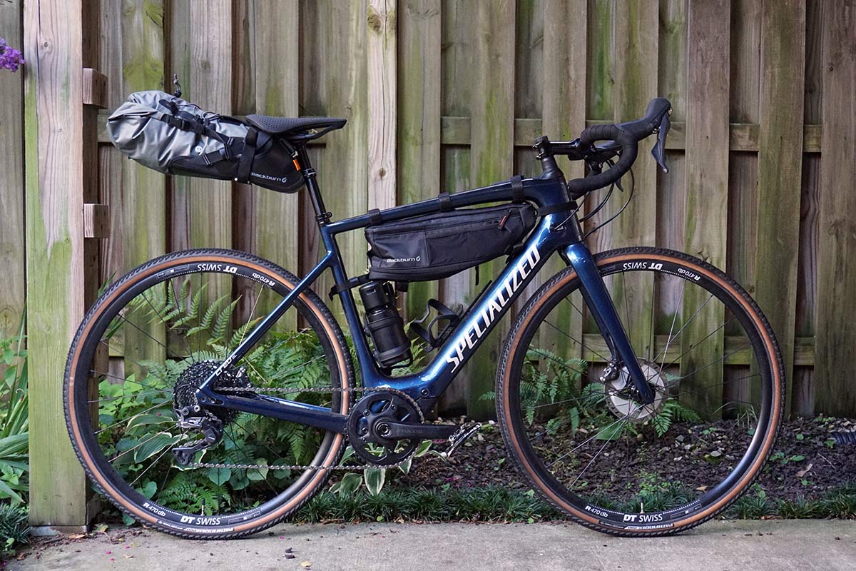 blackburn outpost bikepacking frame bag saddle bag and top tube bag mounted to a specialized creo sl electric assist road bike