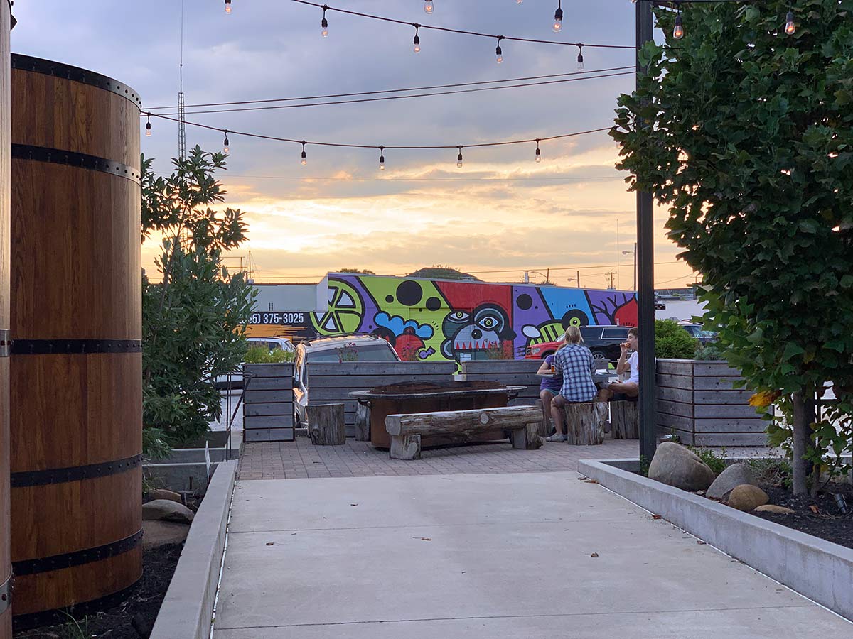 outdoor patio and art as seen from elkmont exchange food and brewery in knoxville
