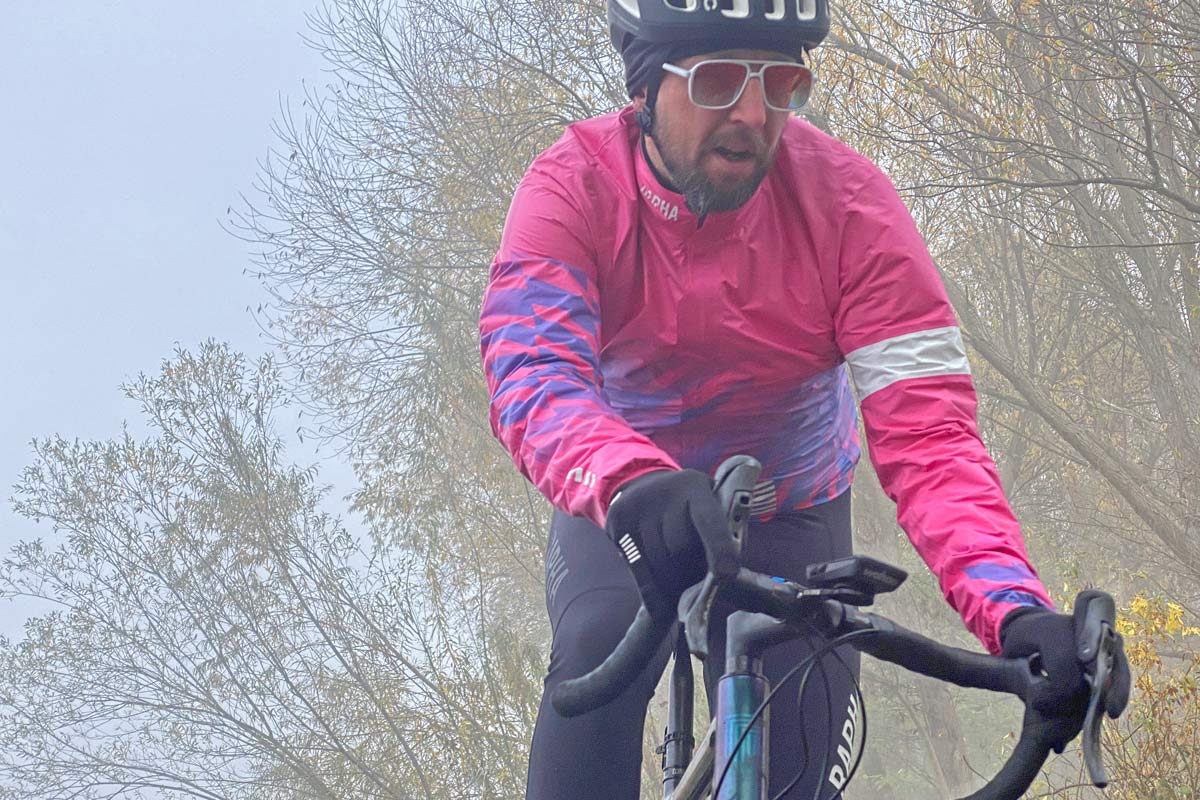 Exclusive Review: Rapha Pro Team Lightweight Gore-Tex Jacket printed in pink Technicolor, extra full color Shakedry visibility, front