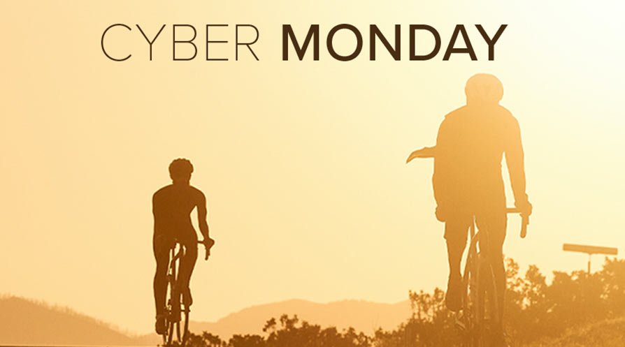 competitive cyclist cyber monday banner showing riders against sunset