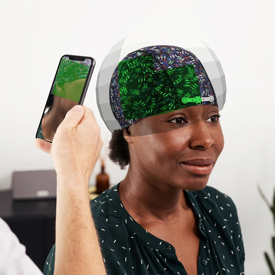 HEXR 3D printed helmet fitting with phone