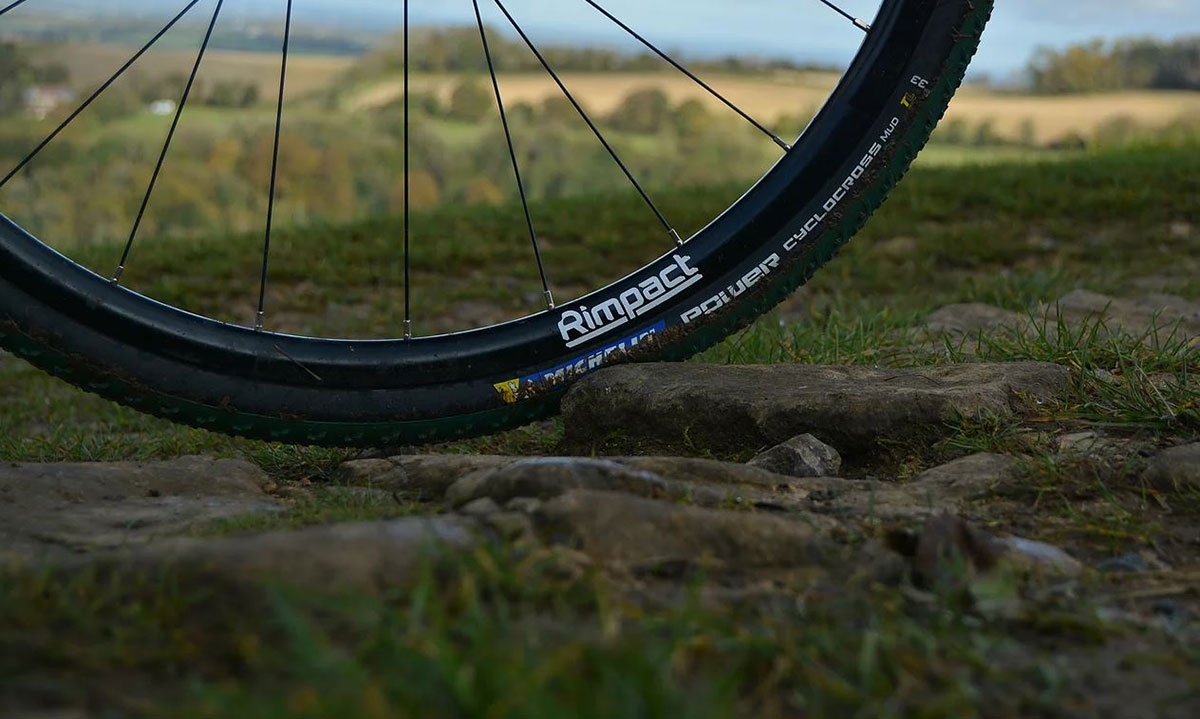 rimpact tire insert for cyclocross racing on clincher tires offers rim protection vibrtion damping anti-pinch flat