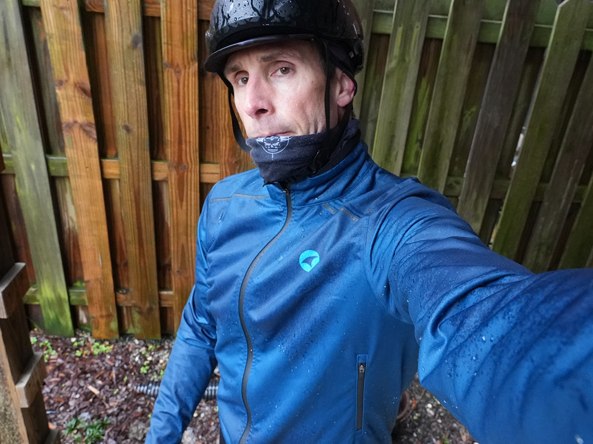 waterproof cycling jersey shown with rain soaking it