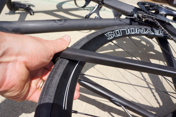 how to true a bicycle wheel on the road or trail without tools so you can keep riding