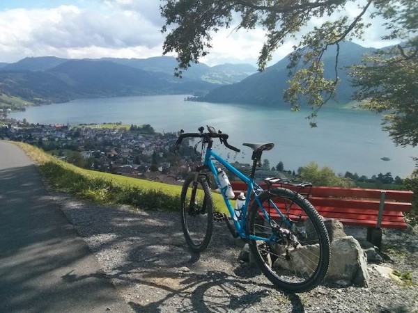 bikerumor pic of the day "View of the Ägerisee lake, Switzerland, on a sunny autumn day. And a custom-built Salsa Fargo with a SRAM X0 drive-train, dynamo lights.