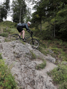 Bionicon_Edison_EVO_enduro_26inch_mountain_bike_black_on-trail_descending_boulders