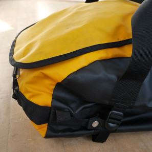 Thule_Chasm-Medium_water-resistant-convertible-duffel-bag_Zinnia-yellow_compressed-detail