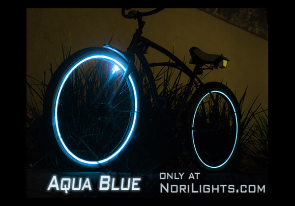 Nori Lights aqua blue kit on bike