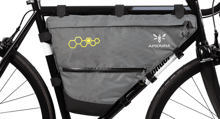 Apidura packs more inside the front triangle, plus stem snacking ...
