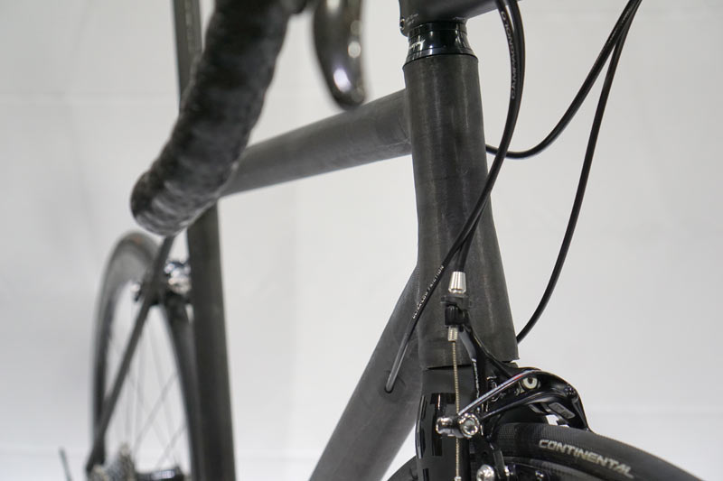 raw carbon bike frame