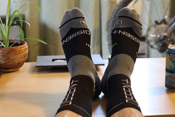 Dissent Labs socks, feet up