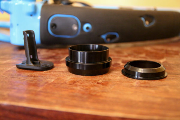 Left to right: Pivot Cable Port system Di2 Battery Plug, 17mm lower headset cup, Zero Stack lower headset cup.