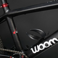 Fair Wheel Bikes customizes a super light Woom Carbonara 20” MTB for one lucky kid