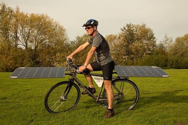 Maxun One solar e-bike, standing with bike