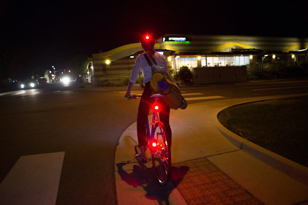Arsenal Cycling 4sync lights, rider from behind