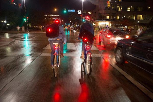 Arsenal Cycling 4sync lights, riders at night