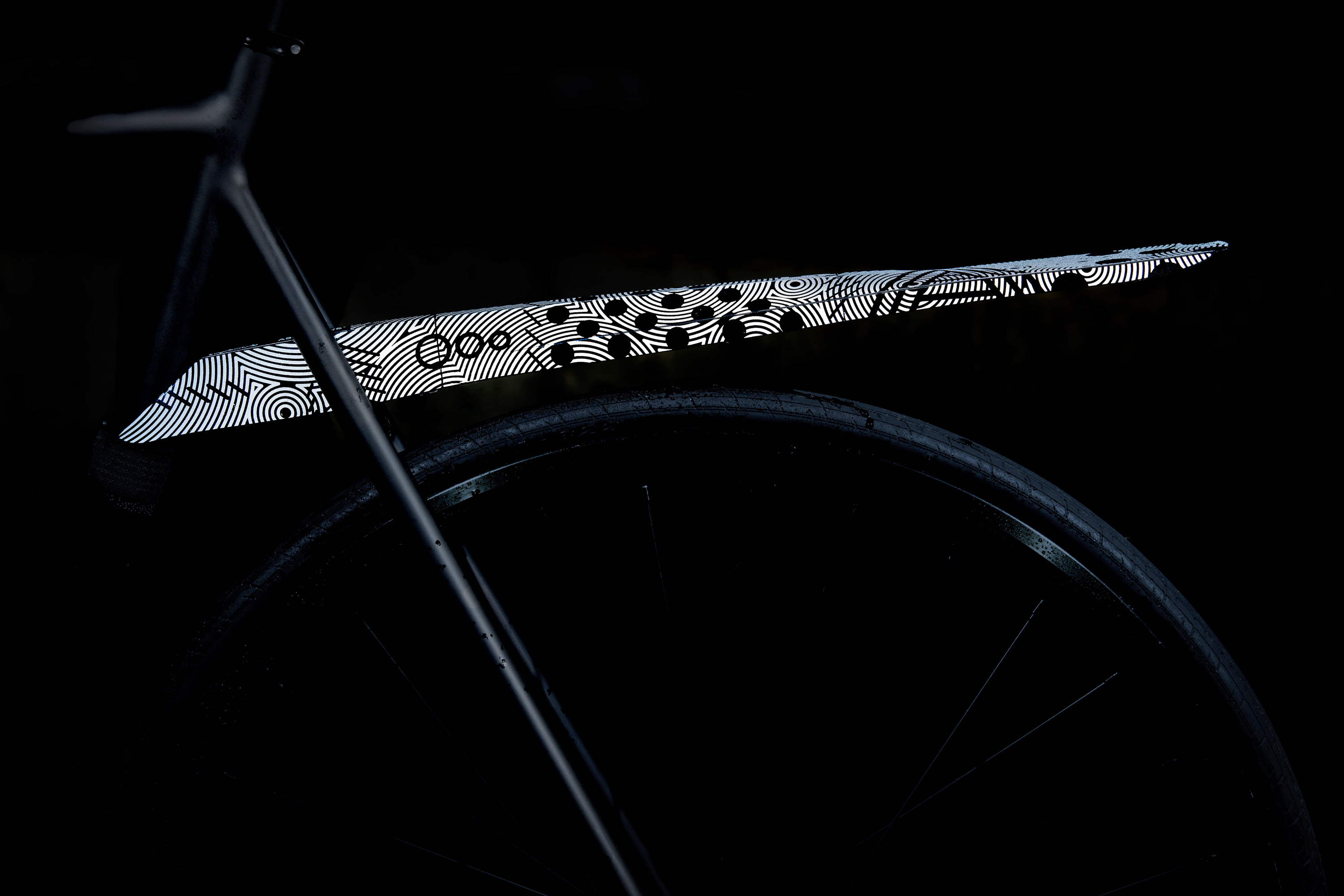 Featured image for the article Ass Savers pops new reflective Fendor Bendor mudguard collaboration with Bicycle Crumbs