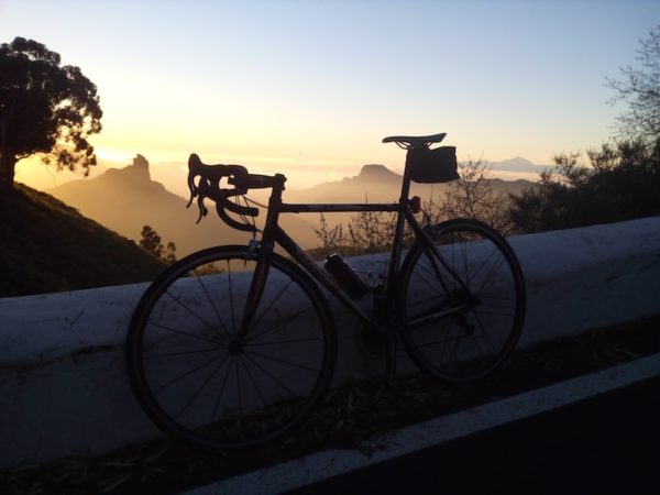 bikerumor pic of the day cycling Gran Canaria with Mount Teide Tenerife in the canary islands of spain.