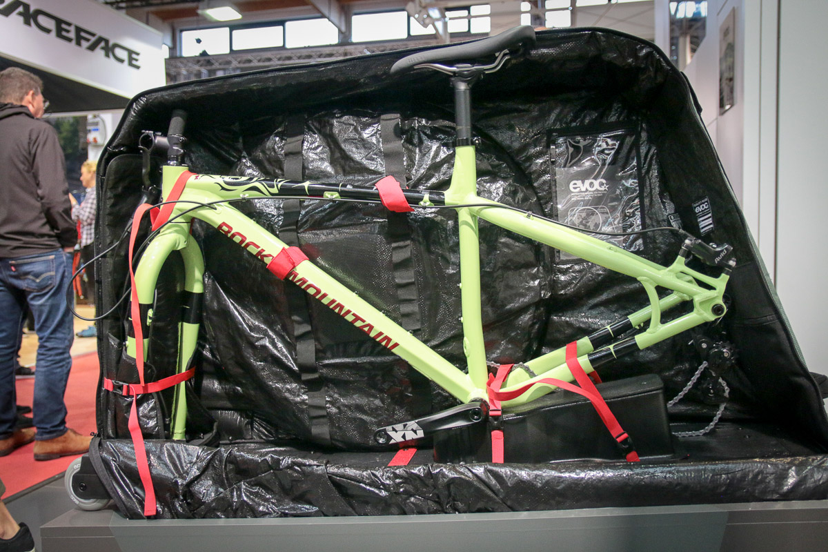 EVOC packs a fat bike in Travel Bag XL, spare batteries in FR Trail E-Ride