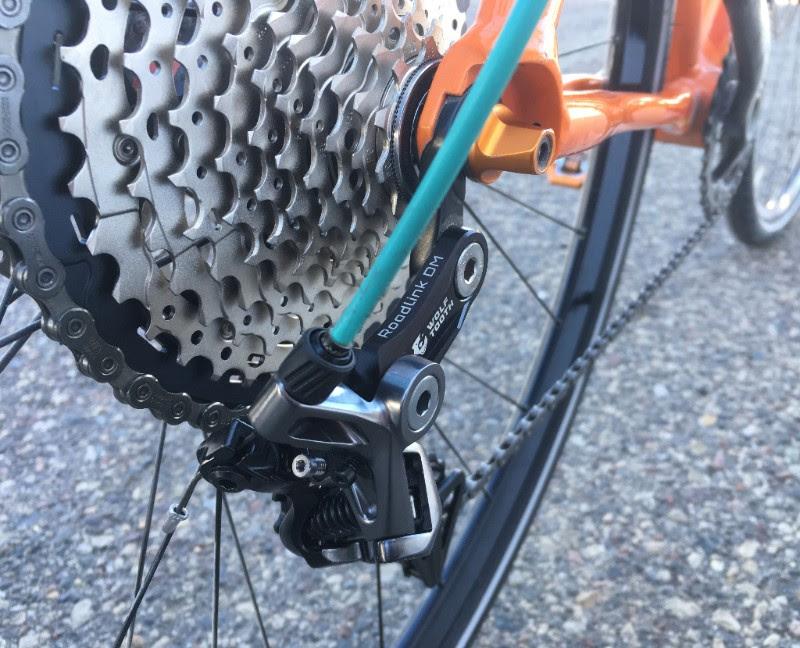 https://bikerumor.com/wp-content/uploads/2018/03/Wolf-Tooth-Components-WTC-Road-Link-DM-Shimano-R8000-R9100-dura-ace-Ultegra-derailleurs-4.jpg