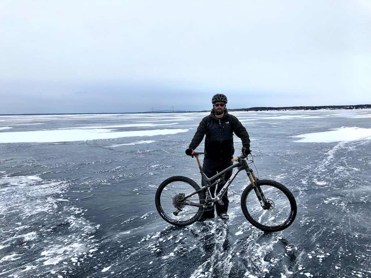 bikerumor pic of the day Biking over the ice bridge from St. Ignace Michigan to Mackinaw Island. Zoom in and you can see the Mackinaw Bridge in the background.