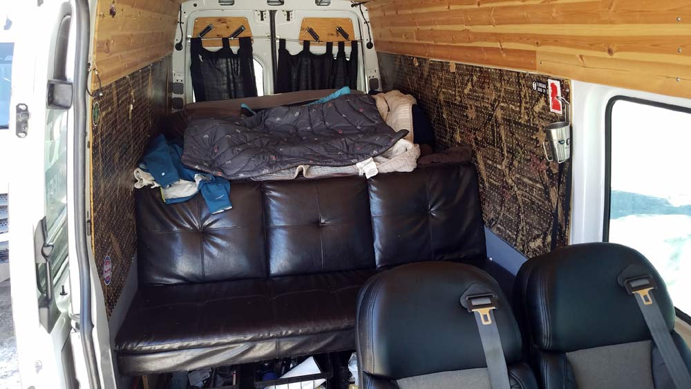 is it legal to add rear seats to a cargo van