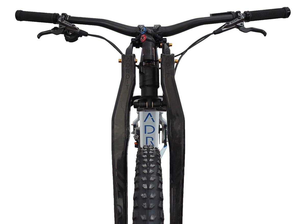 Adroit Cycleworks Linkage Fork uses a rear shock and parallelogram arms to give you less stiction friction and more tuning options for long travel trail and enduro mountain biking