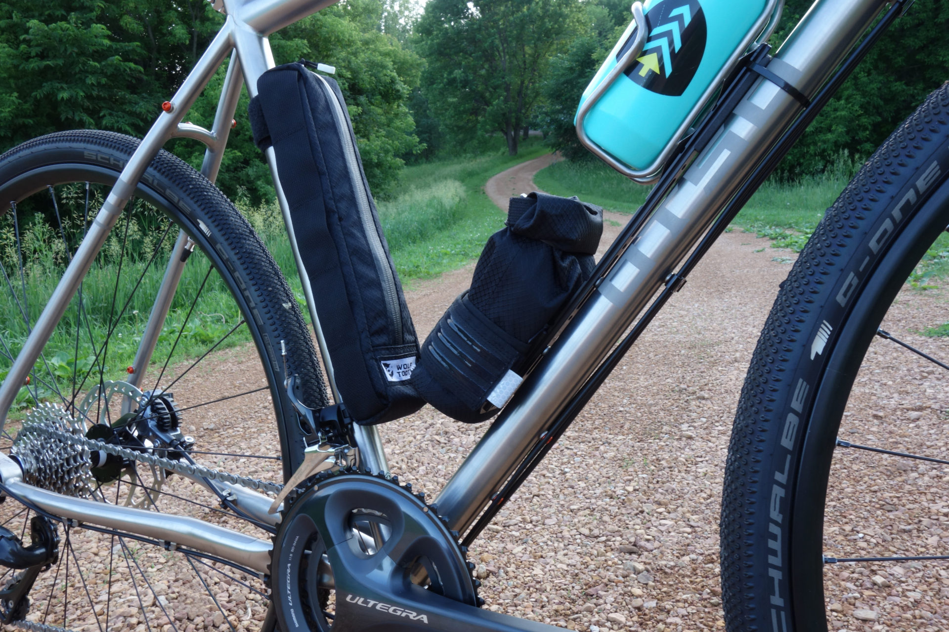 Wolf Tooth Components Adds Extra Baggage With B-rad Pump Bag & Roll Top 