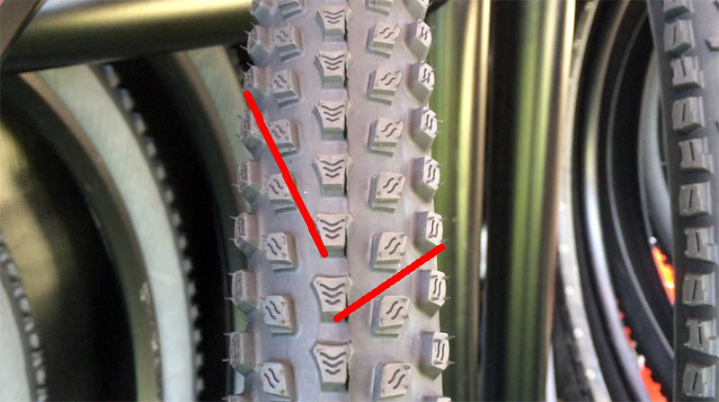 how do mountain bike treads create cornering edges