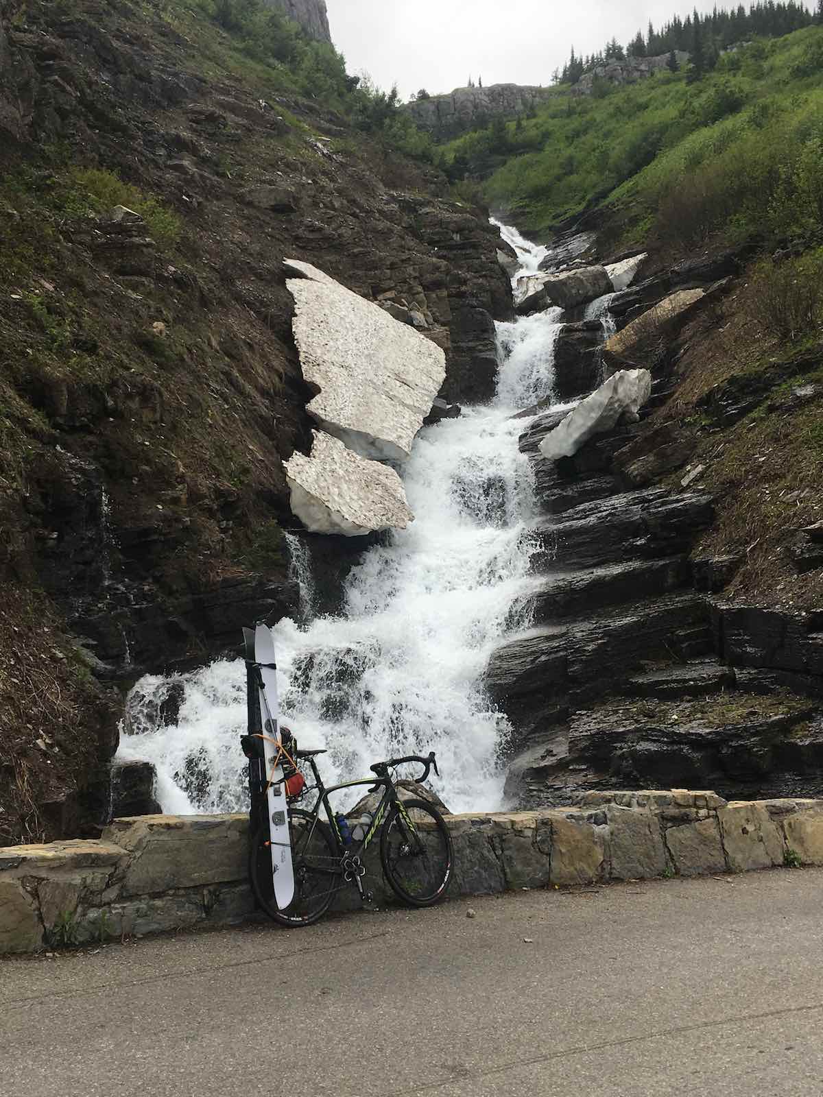 bikerumor pic of the day, riding bikes up the sun road in Glacier National Park in Montana. Skis included.