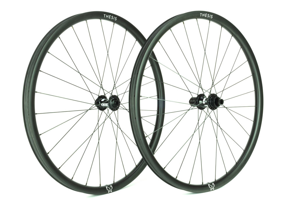Thesis ultra wide aero carbon fiber road and gravel bike wheels with graphene fibers to improve strength and impact resistance