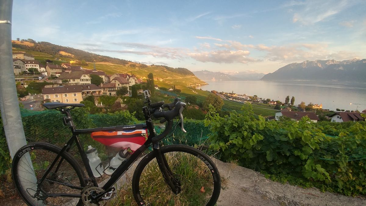 bikerumor pic of the day cycling in Lausanne, the Lavaux Vineyards in Switzerland on lake Geneva.