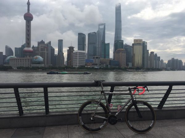 bikerumor pic of the day Overlooking the Pudong skyline in Shanghai China, from the Bund side of the Huangpu River with Mosaic bicycle.