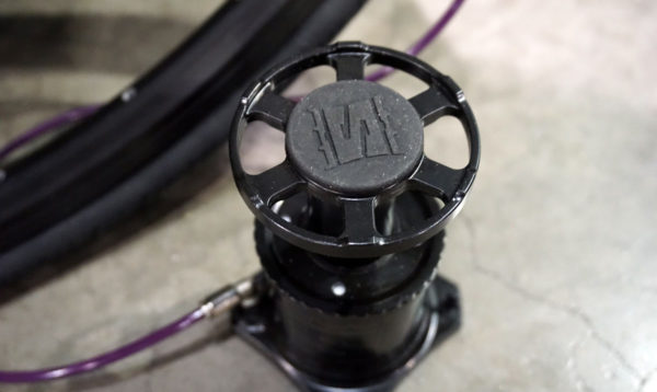 Stompump bicycle floor pump fills bicycle tires faster than standard pumps