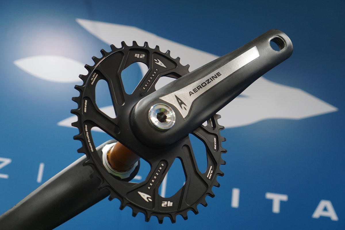 Featured image for the article Aerozine offers adjustable crank arm length, modular spindles & ti chainrings