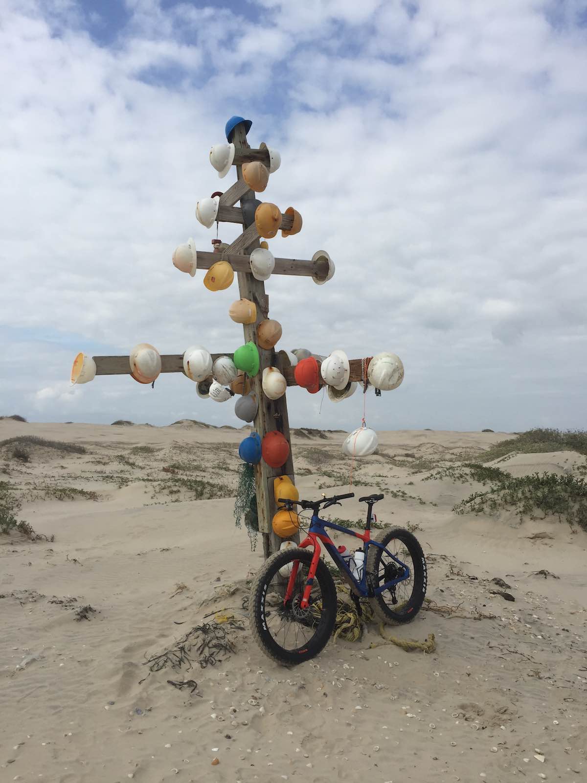 bikerumor pic of the day fat biking south padre island in texas with hard hats from oil rigs.