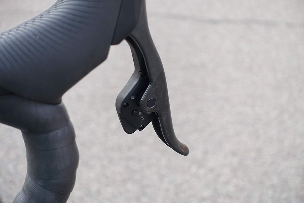 what does the small button do on the inside of a SRAM eTap shifter