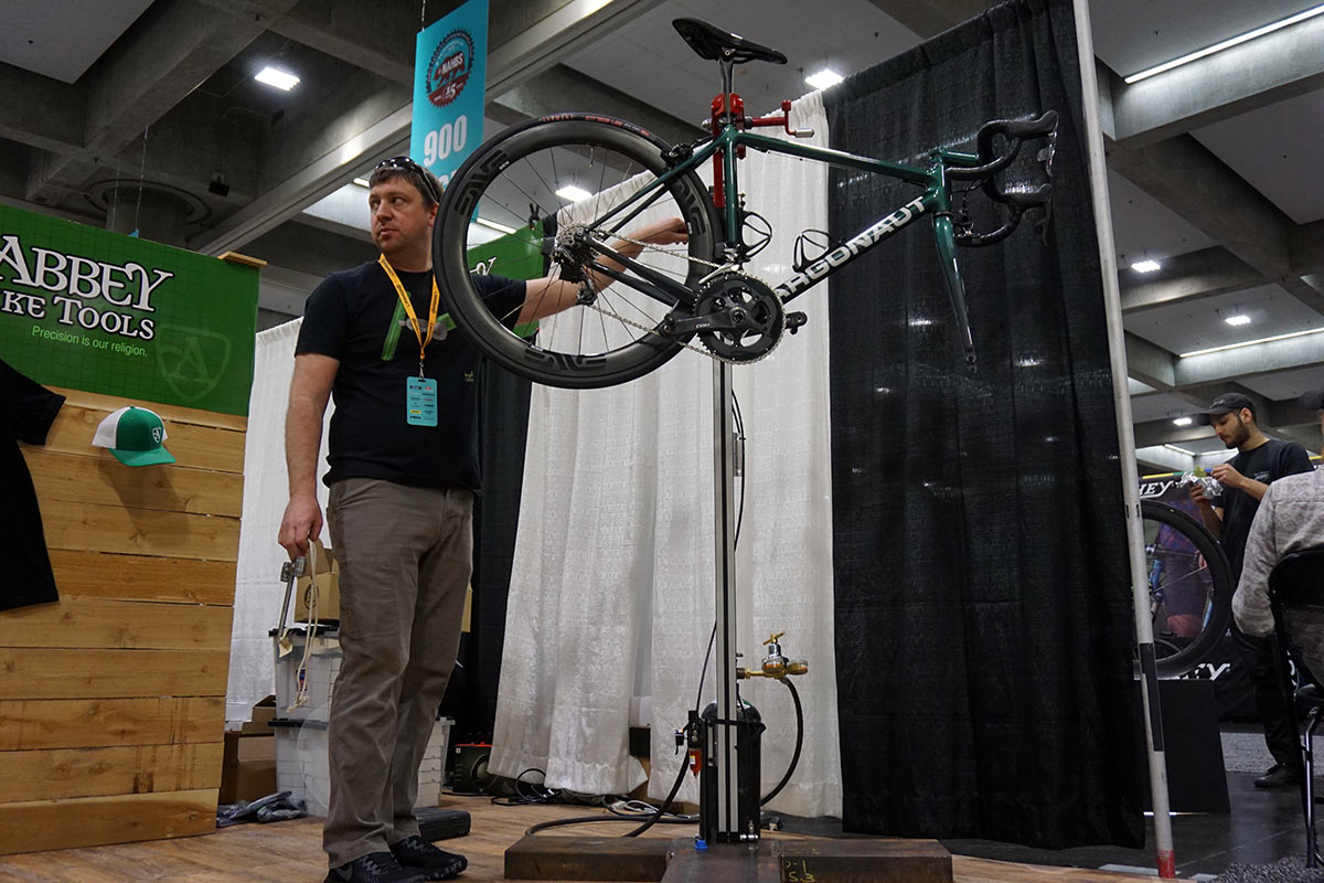 abbey bike tools pneumatic bicycle workstand prototype lifts the bike for you with the flick of a switch