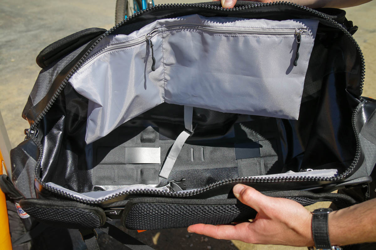 EVOC adds compact frame bags & minimalist waist belt, Ortlieb blacks out for bikepacking
