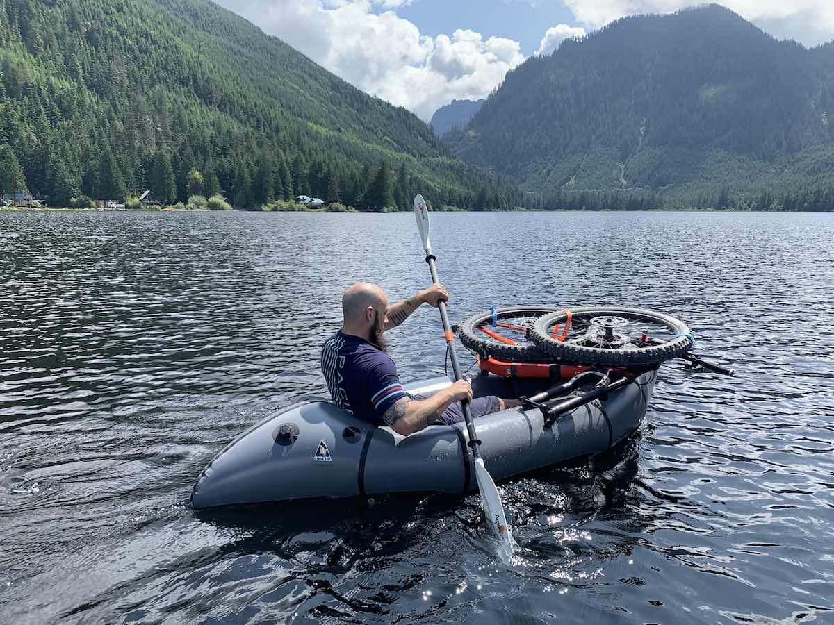 bikerumor pic of the day pack rafting on the lake with salsa cycles and Alpacka Rafts in the Snoqualmie national forest in washington.