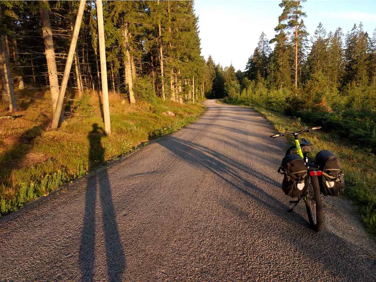 bikerumor pic of the day standing on a back road in southern sweden after a night of bikepacking.