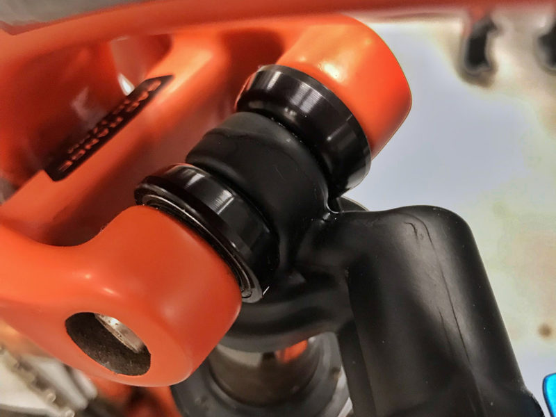 Fox smooths rear shock motion w/ roller bearing mounts, FIT4 damper