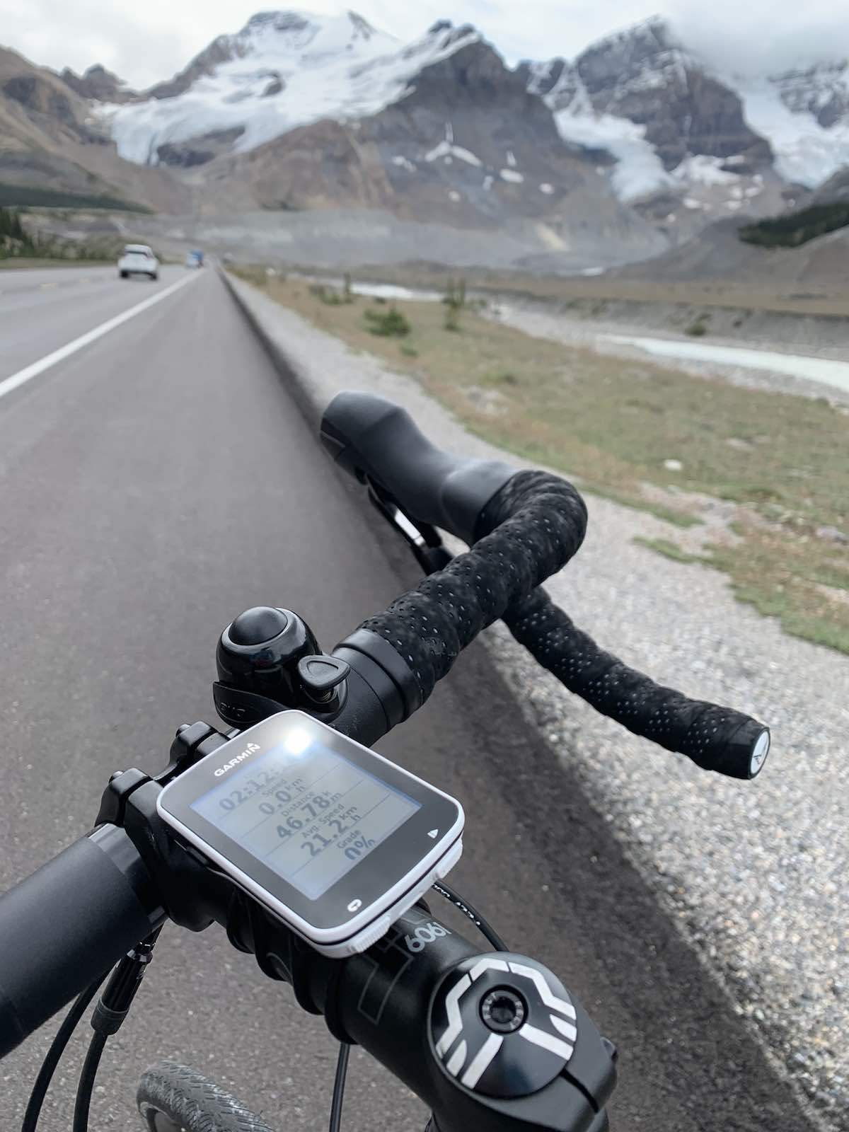 bikerumor pic of the day bike riding up to the columbia ice fields in banff and jasper national park.
